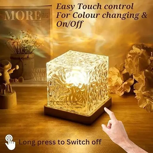 Aurora Borealis Night Light Projector casting colorful dreamlike light patterns in a cozy dark room